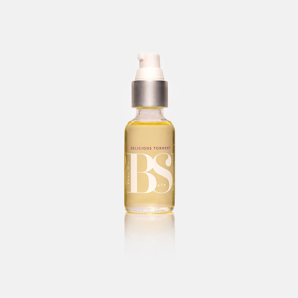 
                  
                    Bath Slut Body Oil Gift Set in Delicious Torment scent with nectarine, honeysuckle, and peony. Perfect for hydrated, glowing skin with plant-based oils and seductive fragrances. Features antioxidants and anti-aging benefits for silky, nourished skin.
                  
                