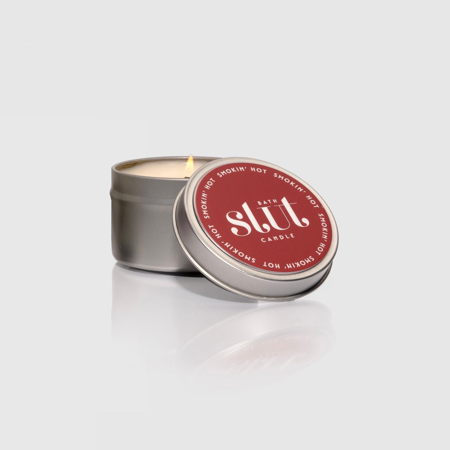 Bath Slut Smokin’ Hot Body Soy Wax Candle in a 2oz travel-size tin from the Bath & Body Care Gift Set.